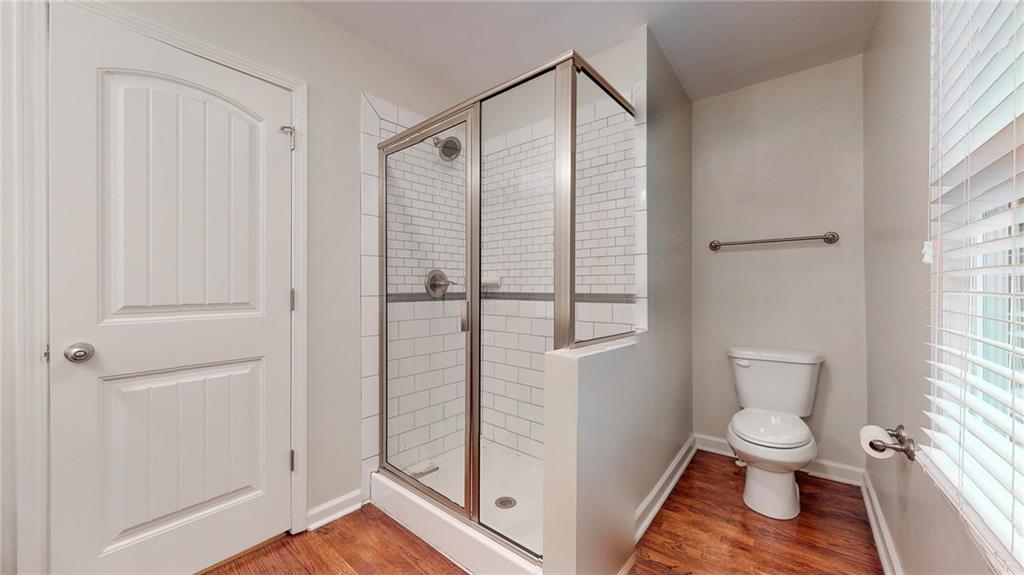 2305 Vistamont Drive Decatur, GA 30033 - Photo 18 of 28 a bathroom with a toilet and a shower