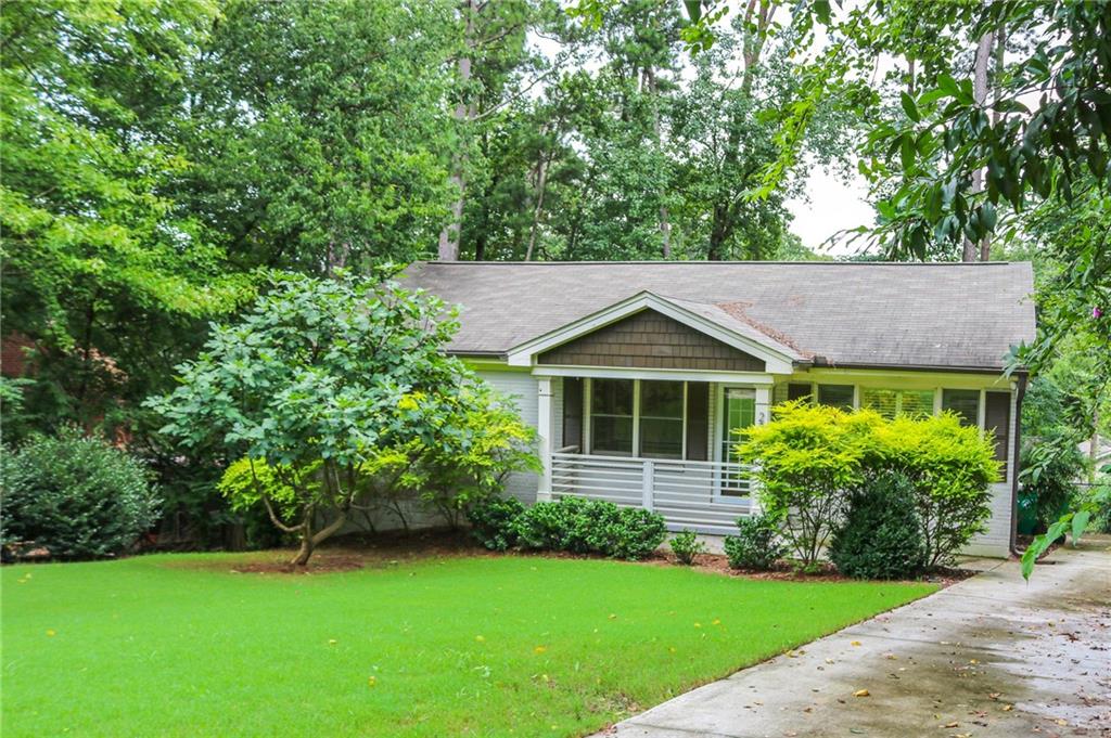 2305 Vistamont Drive Decatur, GA 30033 - Photo 26 of 28 a front view of a house with a yard