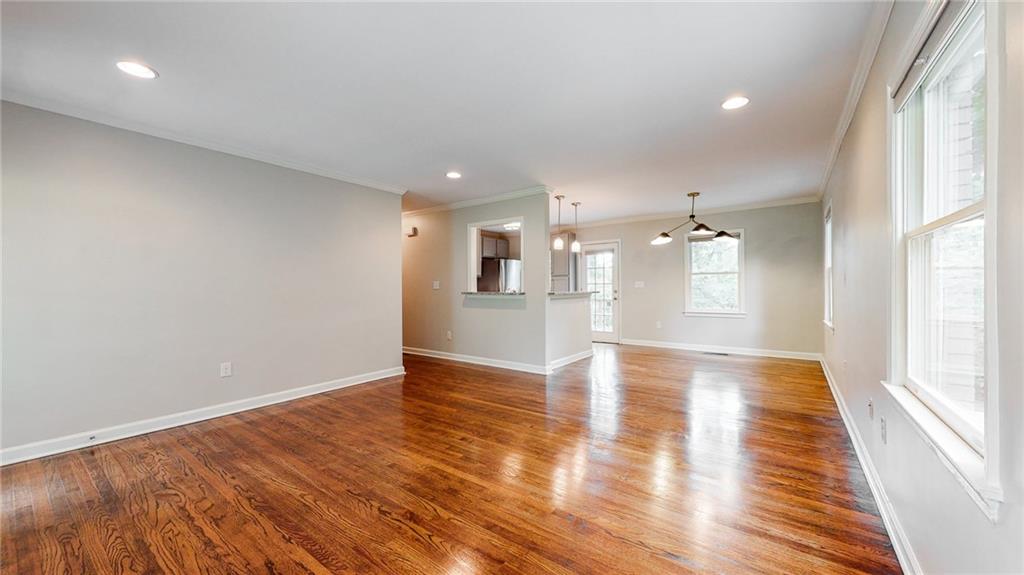 2305 Vistamont Drive Decatur, GA 30033 - Photo 7 of 28 a view of a kitchen with wooden floor and a window