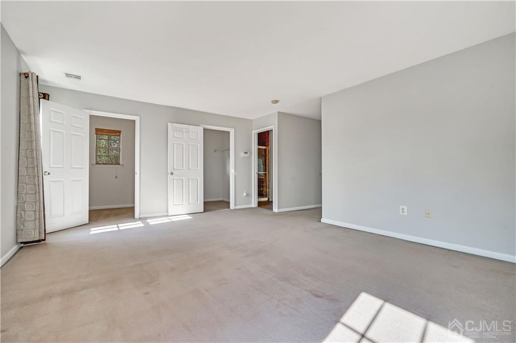 12 Mapleton Road Old Bridge, NJ 08857 - Photo 16 of 22 an empty room with an entryway