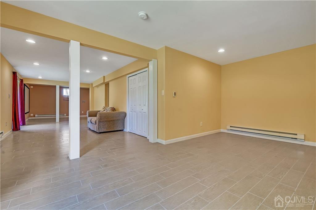 12 Mapleton Road Old Bridge, NJ 08857 - Photo 22 of 22 a view of a livingroom with a staircase