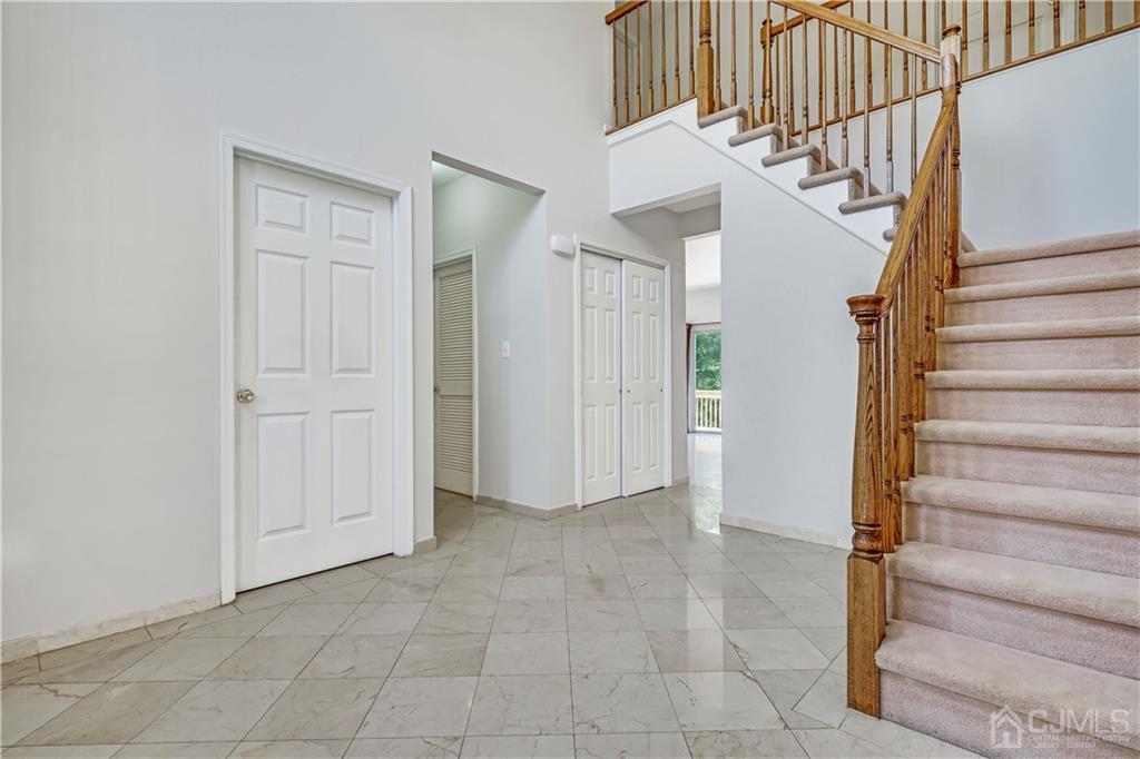 12 Mapleton Road Old Bridge, NJ 08857 - Photo 5 of 22 a view of entryway and hall with a door