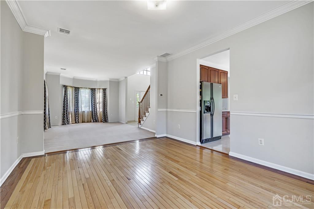 12 Mapleton Road Old Bridge, NJ 08857 - Photo 9 of 22 a view of a room with wooden floor and stairs