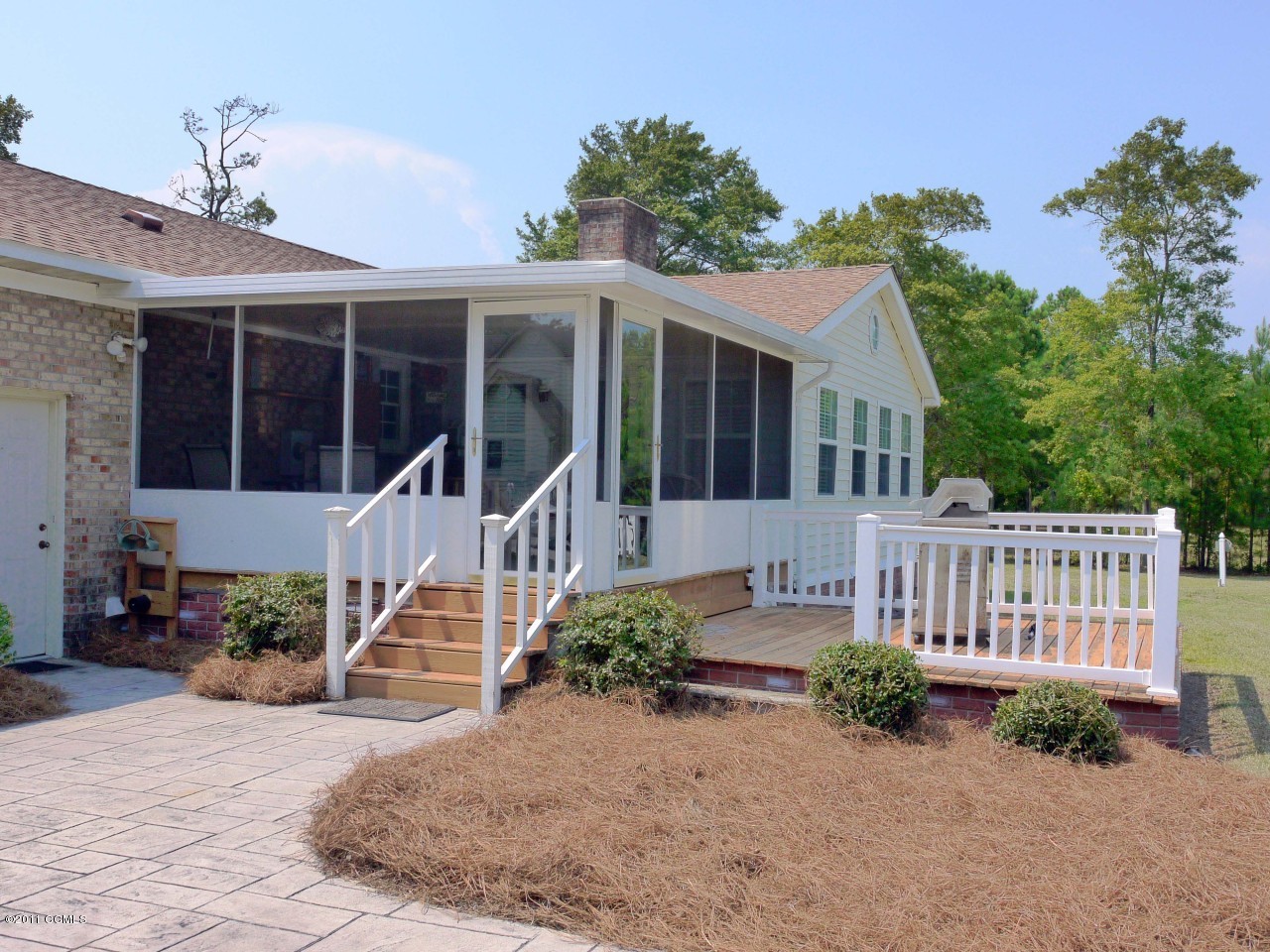 772 West Firetower Road Swansboro, NC 28584 - Photo 24 of 25 Deck and screened porch on the back