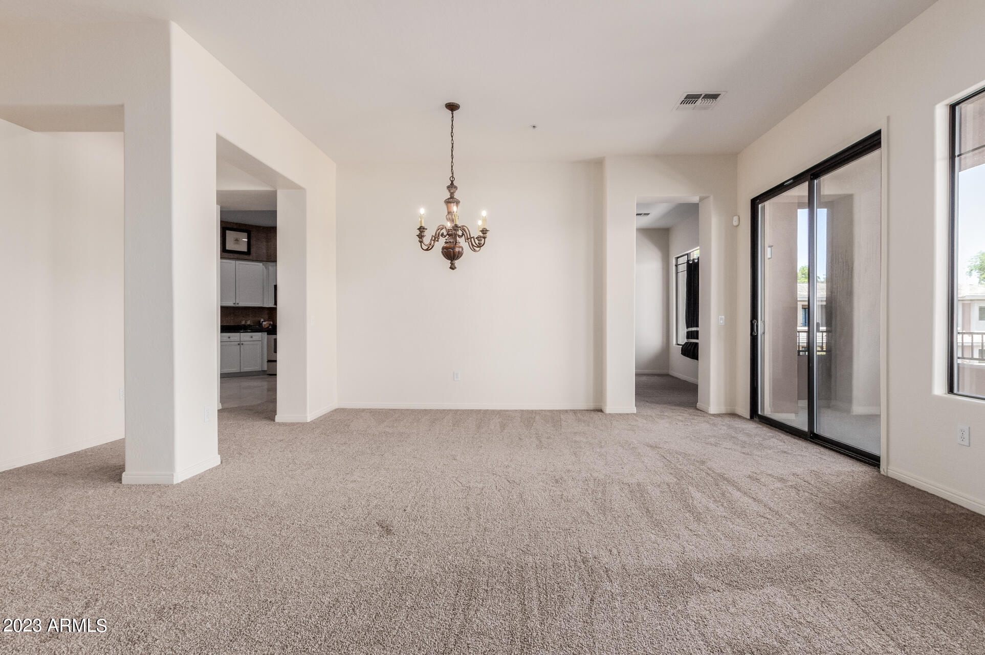 2989 North 44th Street, Unit 3006 Phoenix, AZ 85018 - Photo 15 of 51 Head to Family Room or Kitchen