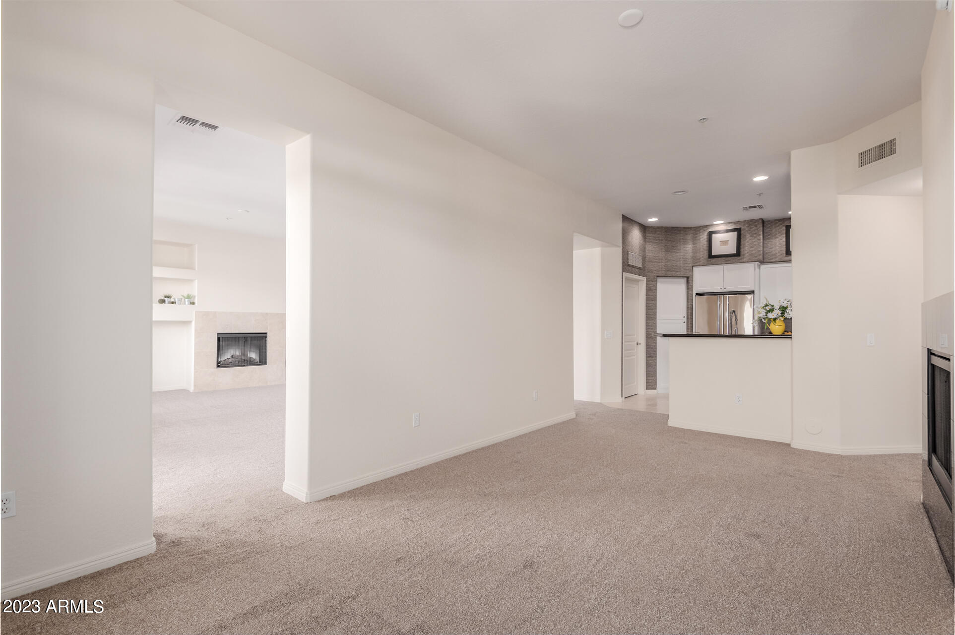 2989 North 44th Street, Unit 3006 Phoenix, AZ 85018 - Photo 18 of 51 Family Room to Kitchen
