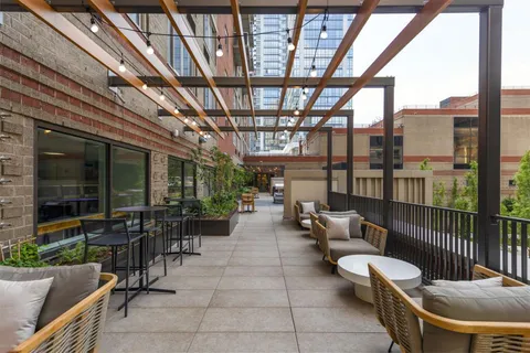 a view of a porch with furniture