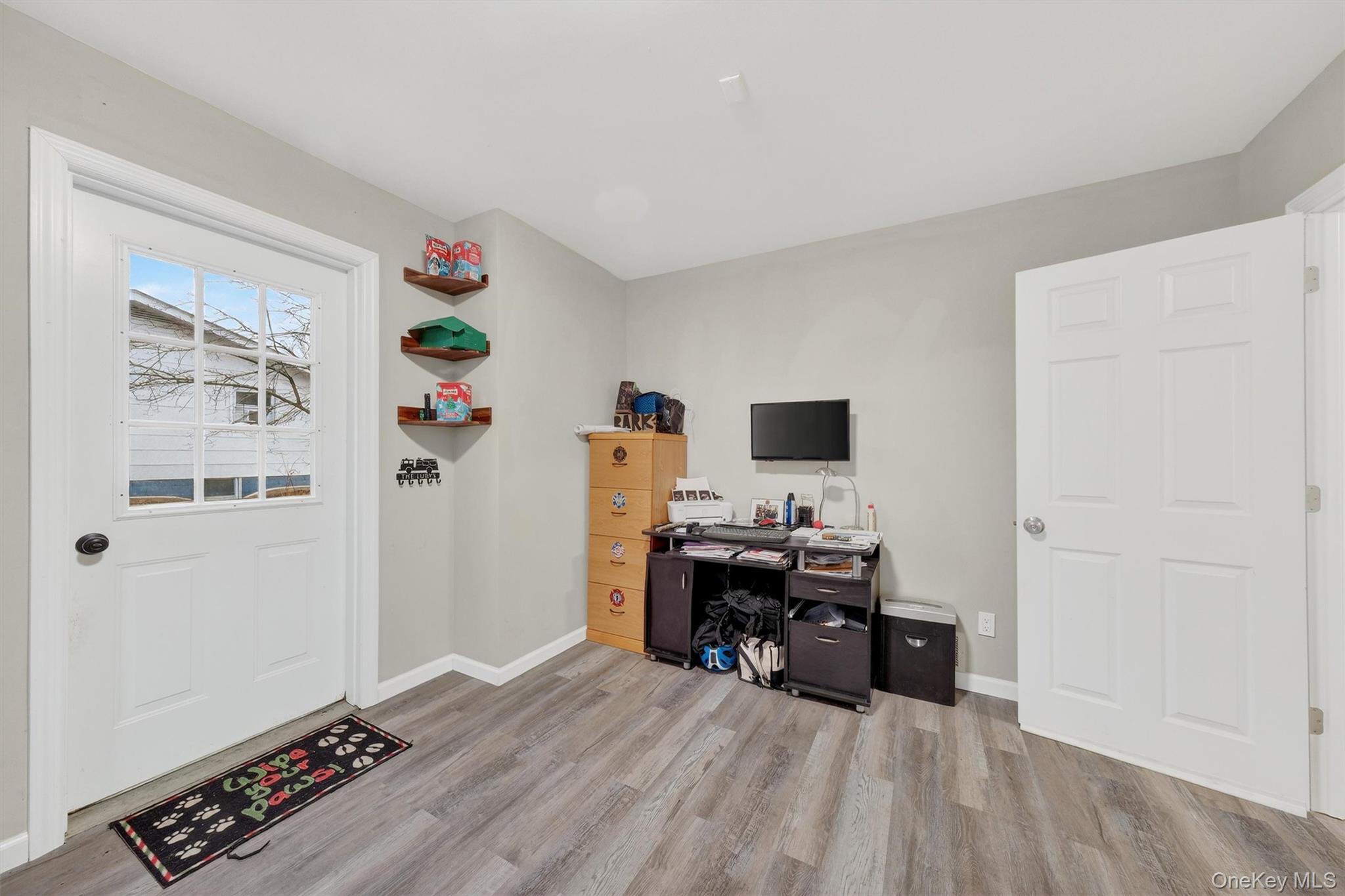 107 Marshall Road Salt Point, NY 12578 - Photo 11 of 26 a view of a workspace with furniture and wooden floor