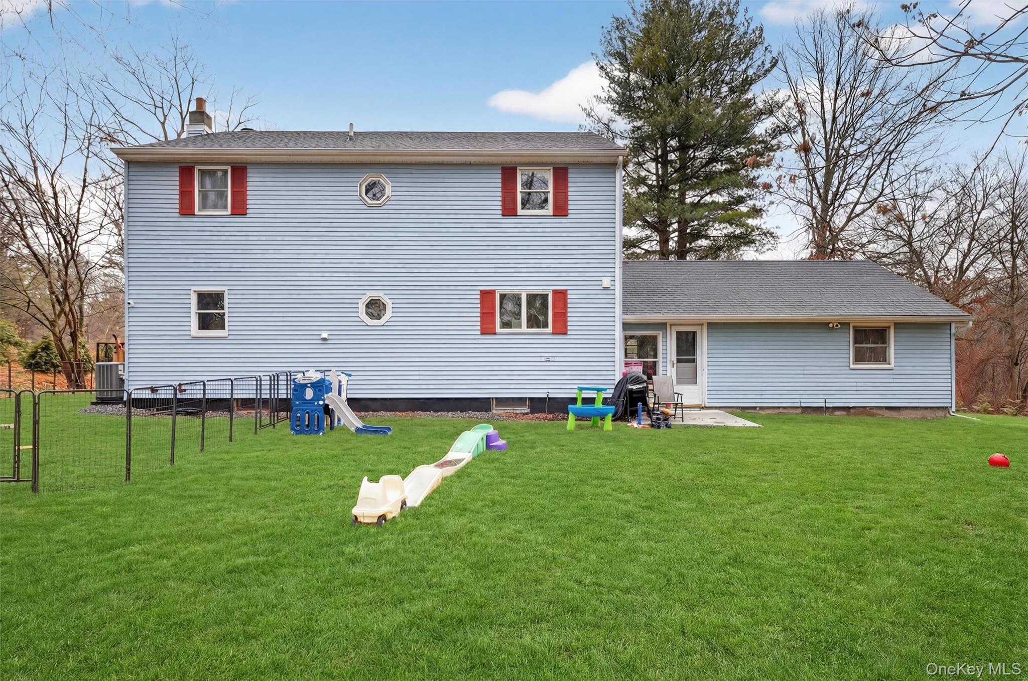 107 Marshall Road Salt Point, NY 12578 - Photo 23 of 26 a view of a house with a backyard