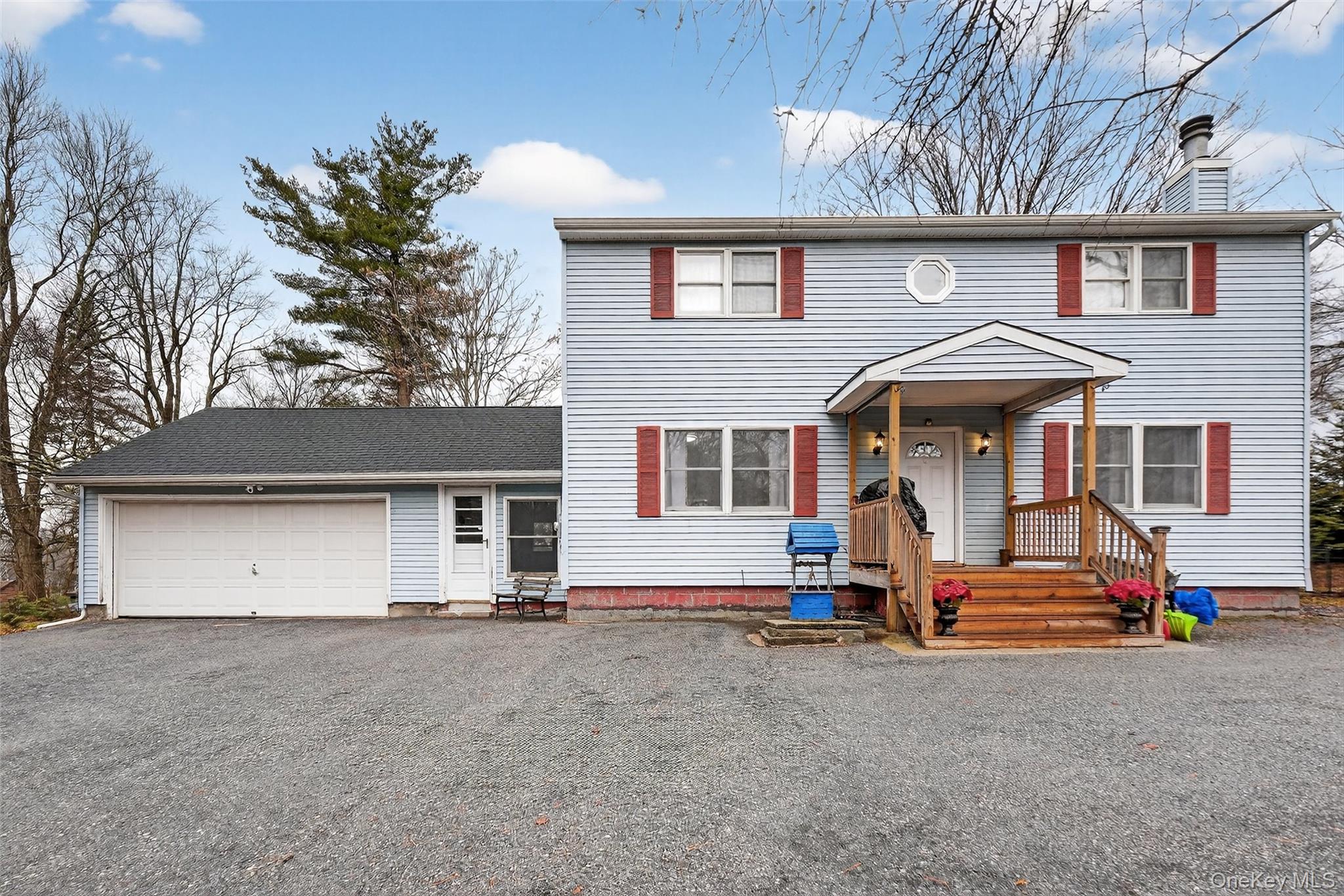 107 Marshall Road Salt Point, NY 12578 - Photo 7 of 26 front view of a house with a patio