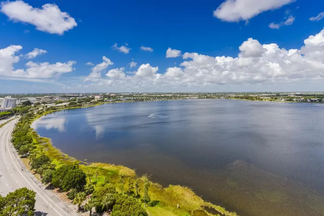 a view of a lake with a city