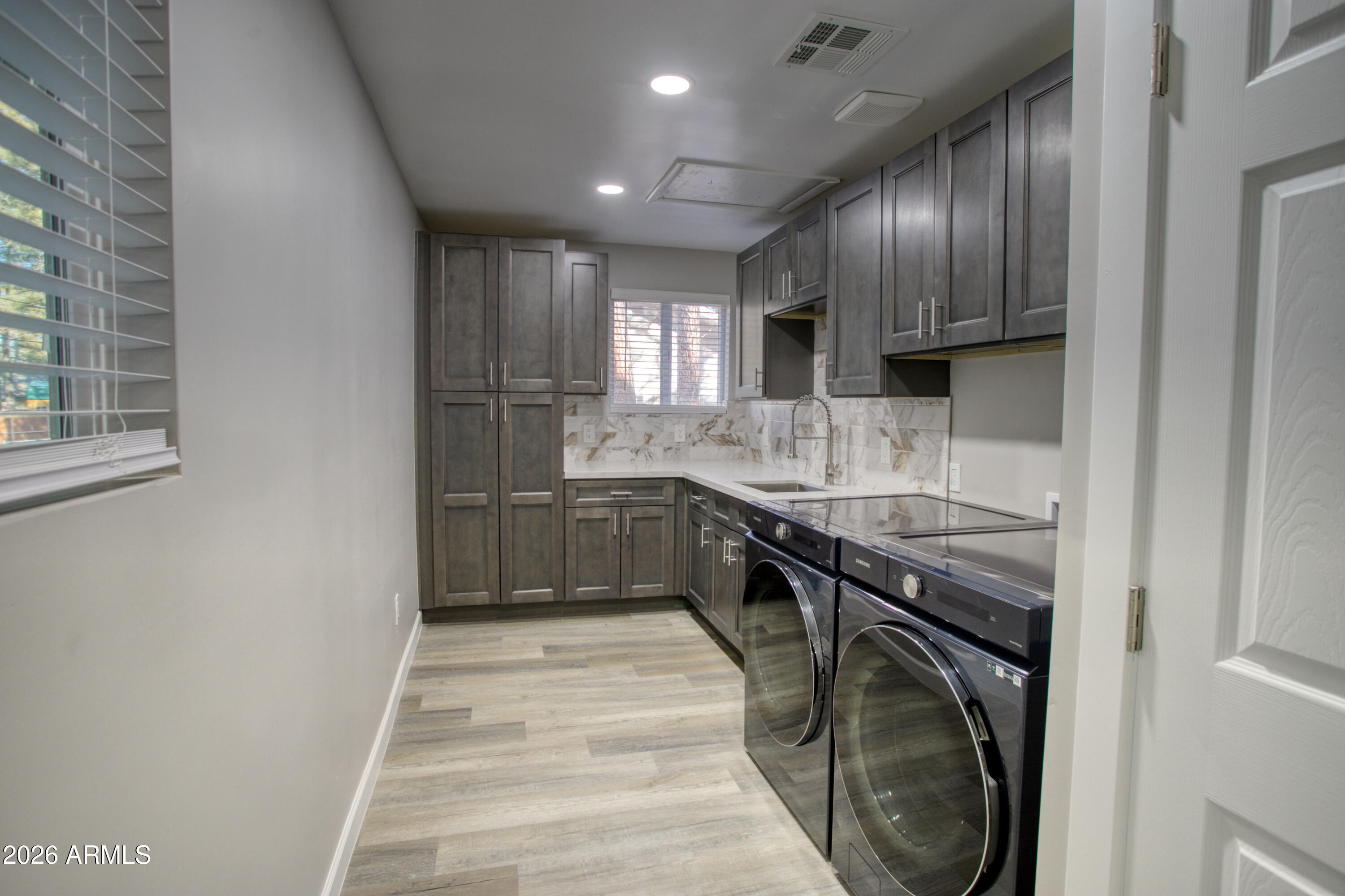 5298 Pine Dawn Road Lakeside, AZ 85929 - Photo 8 of 19 a kitchen with granite countertop a sink stainless steel appliances and cabinets