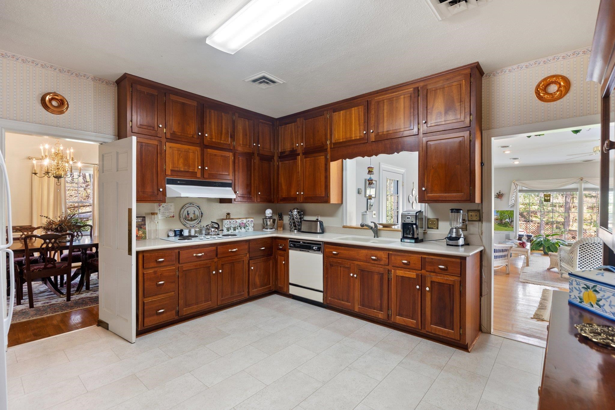 500 Wakefield Circle Staunton, VA 24401 - Photo 22 of 70 a kitchen with stainless steel appliances granite countertop a stove a sink and a refrigerator