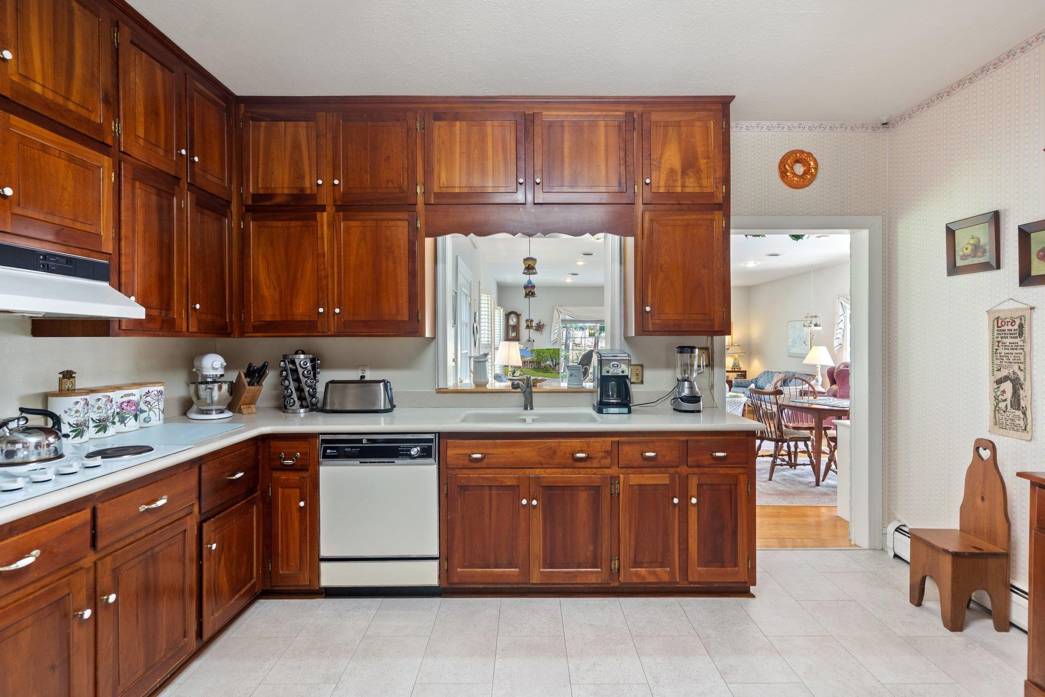 500 Wakefield Circle Staunton, VA 24401 - Photo 25 of 70 a kitchen with a sink and wooden cabinets