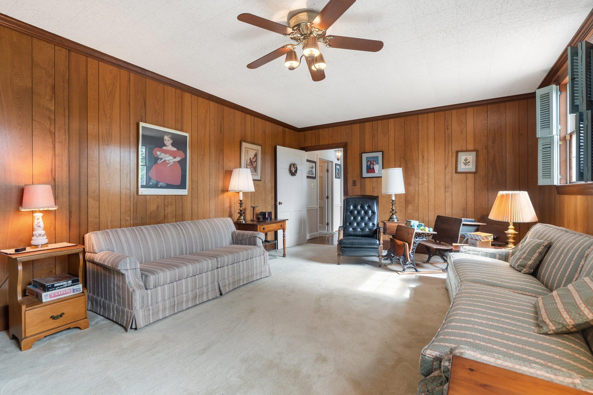 500 Wakefield Circle Staunton, VA 24401 - Photo 47 of 70 a living room with furniture and a chandelier