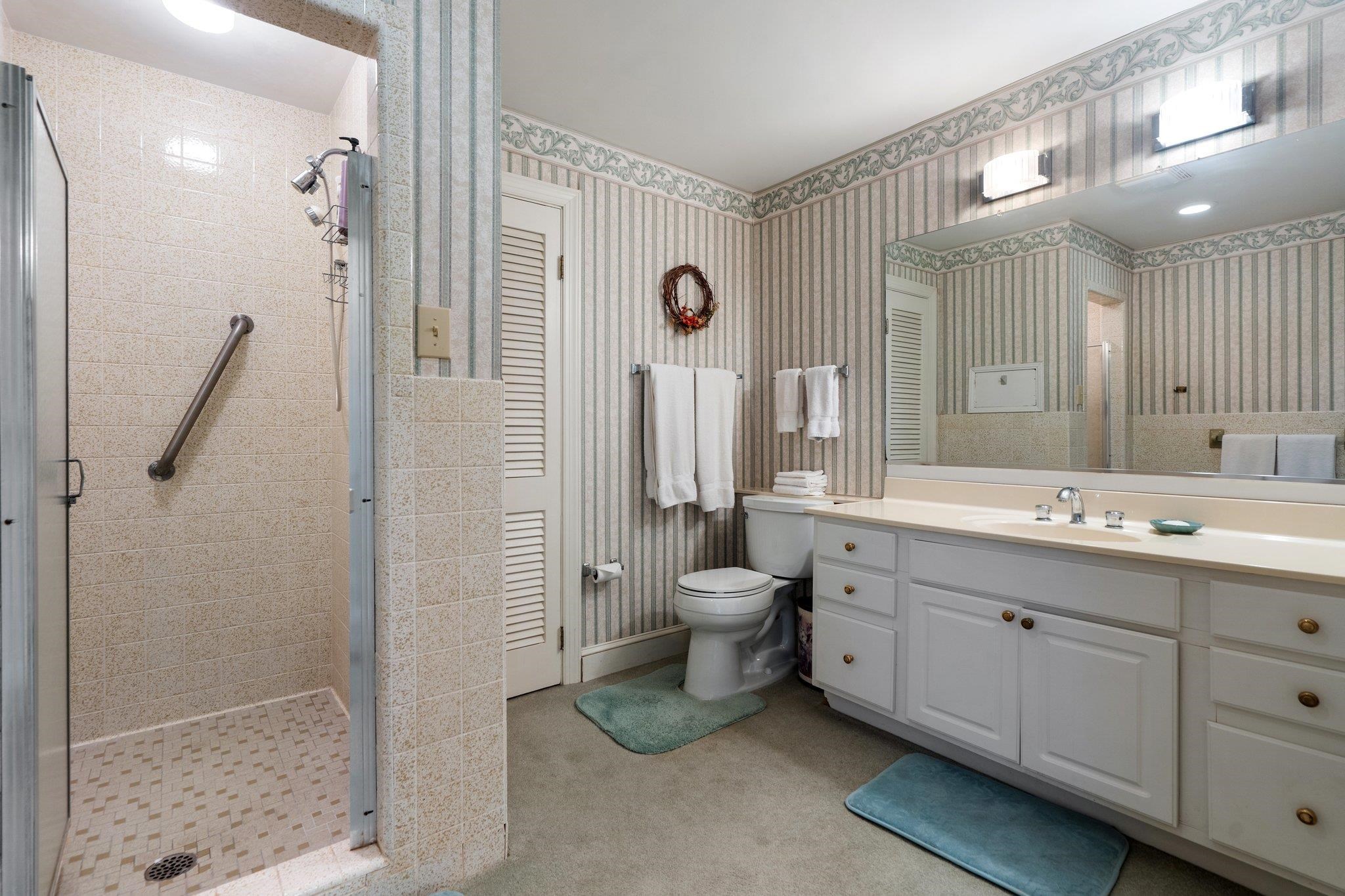 500 Wakefield Circle Staunton, VA 24401 - Photo 51 of 70 a bathroom with a double vanity sink toilet and shower
