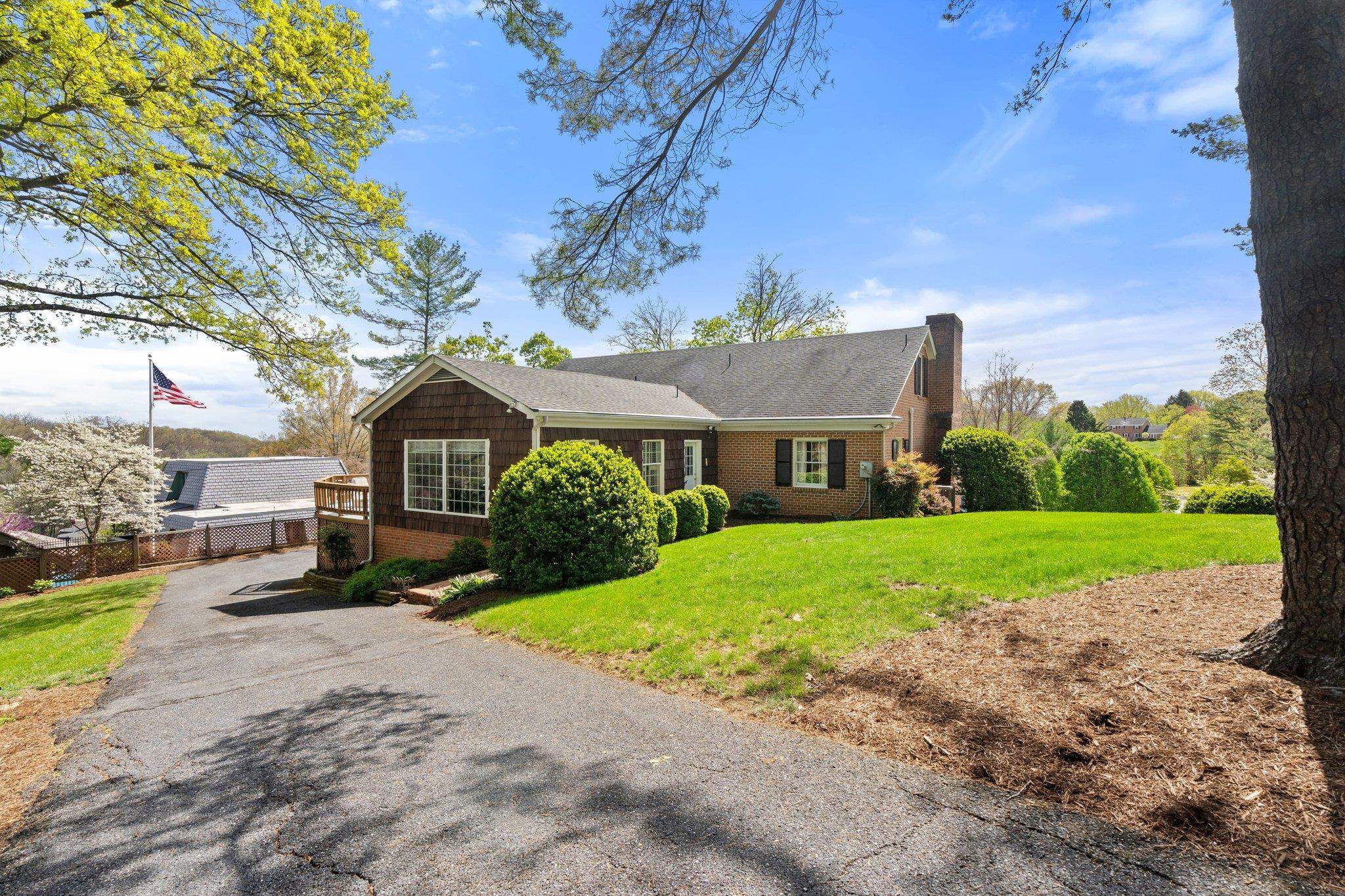 500 Wakefield Circle Staunton, VA 24401 - Photo 62 of 70 a front view of a house with a yard and garage