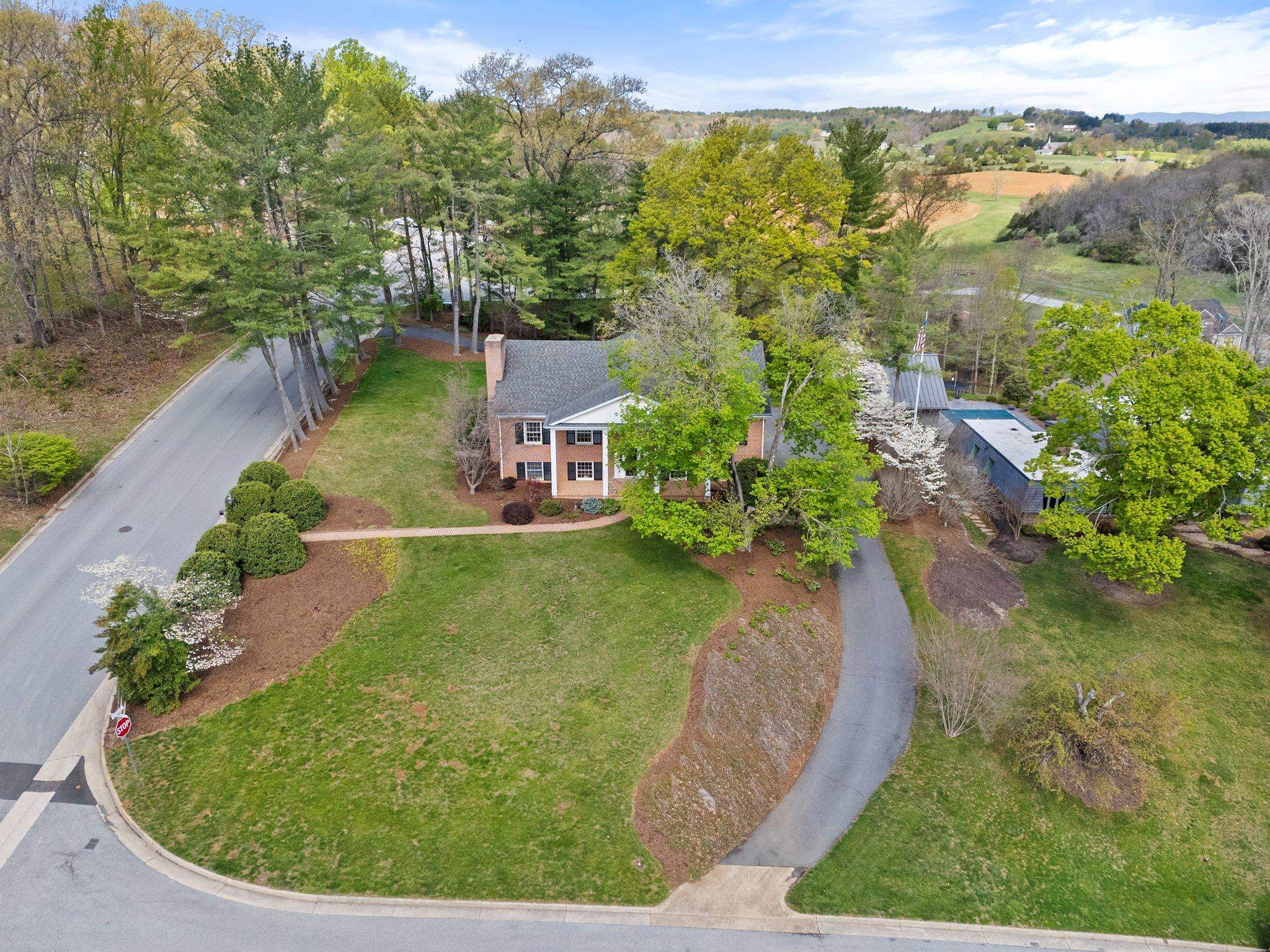 500 Wakefield Circle Staunton, VA 24401 - Photo 68 of 70 an aerial view of a house with a yard and lake view