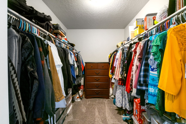 5155 East Rio Grande Way Eagle Mountain, UT 84005 - Photo 23 of 40 Walk in closet featuring dark colored carpet
