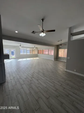 a view of an empty room and window