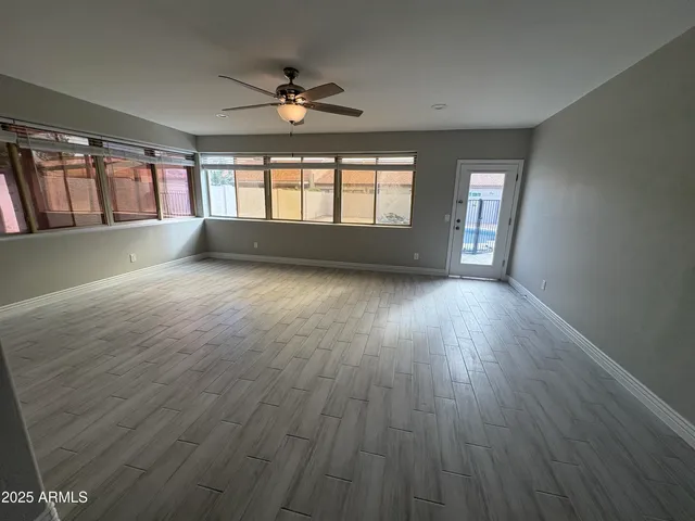 a bathroom with a sink and a large mirror