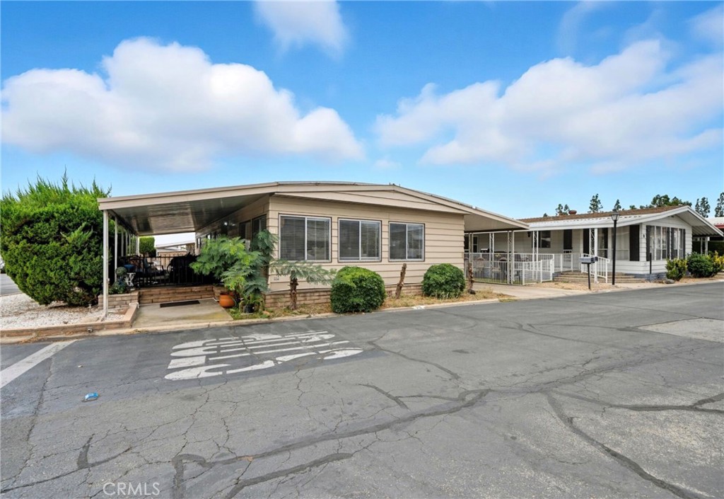 a view of a building with a yard