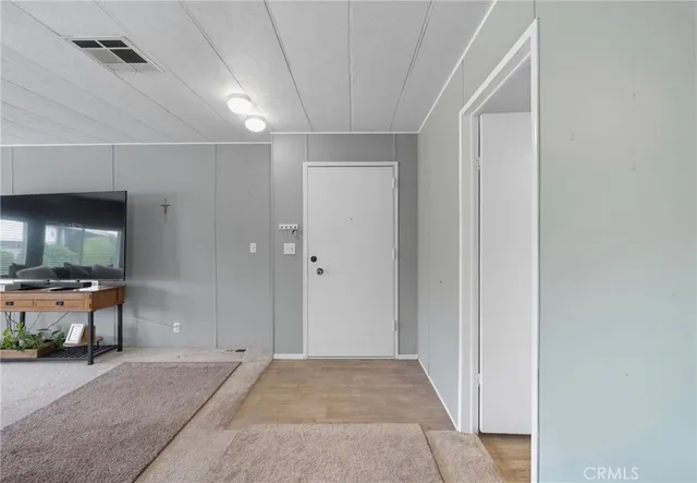 a view of a livingroom with furniture