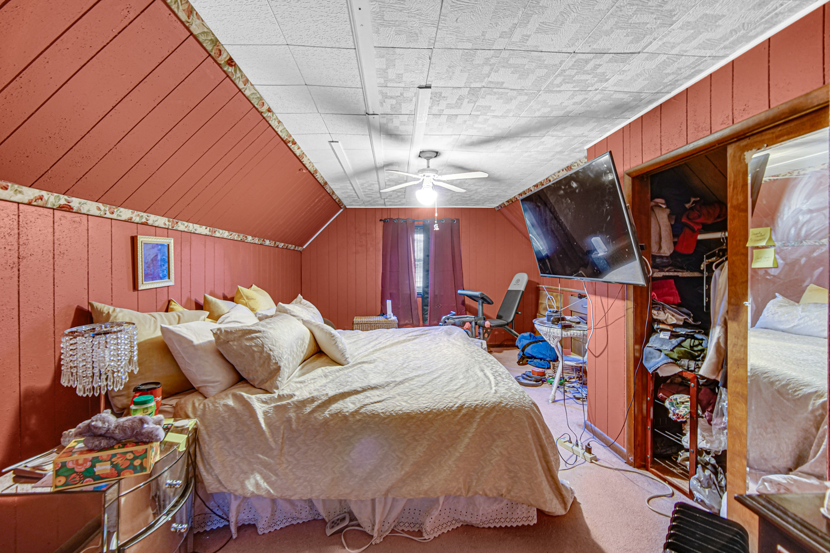 17423 Walter Street Lansing, IL 60438 - Photo 14 of 21 a bed room with a bed and a ceiling fan