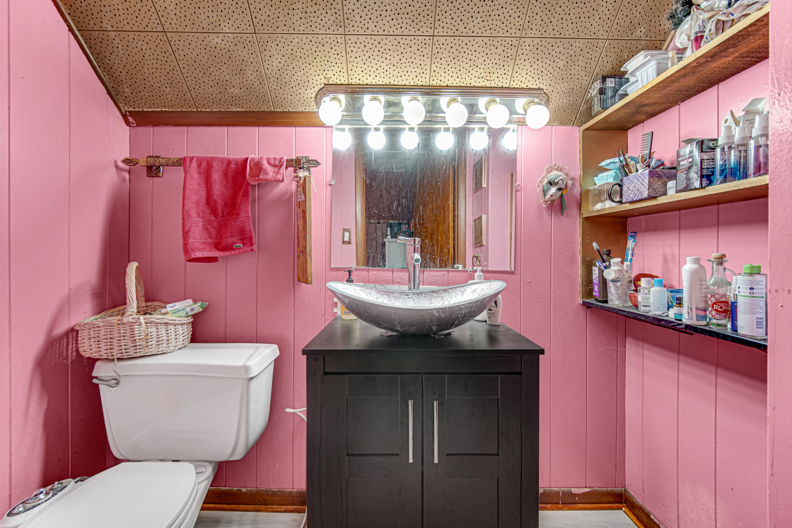 17423 Walter Street Lansing, IL 60438 - Photo 16 of 21 a bathroom with a sink a toilet and shower curtain
