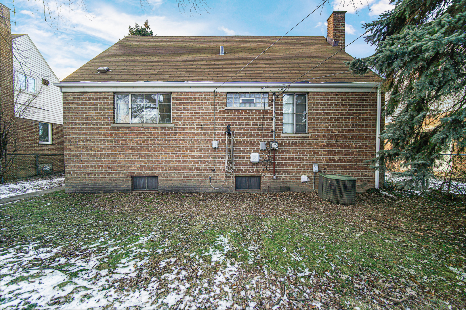 17423 Walter Street Lansing, IL 60438 - Photo 19 of 21 a front view of a house with a yard