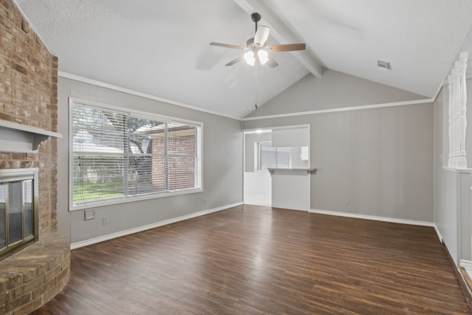 2607 Allyson Court Spring, TX 77373 - Photo 5 of 25 a view of an empty room with a window and wooden floor