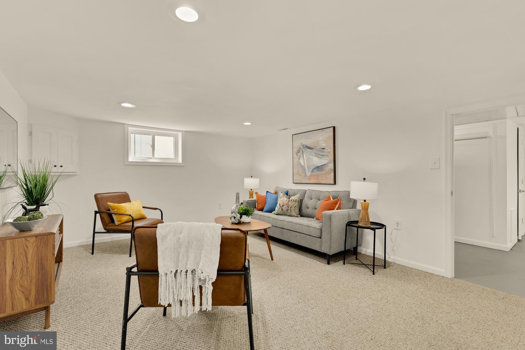 2425 Perry Street Northeast Washington, DC 20018 - Photo 28 of 43 a living room with furniture and wooden floor