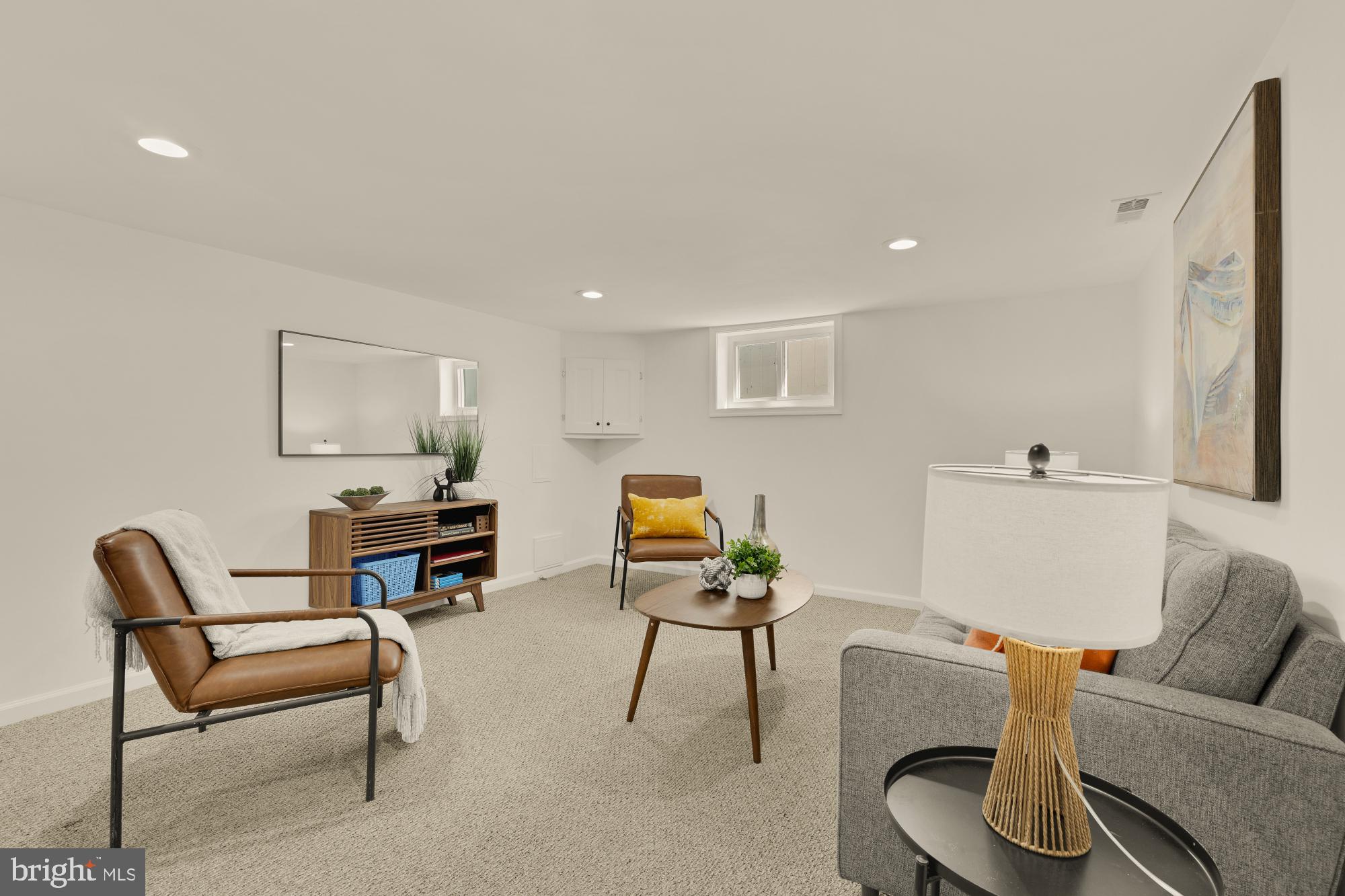 2425 Perry Street Northeast Washington, DC 20018 - Photo 29 of 43 a living room with furniture and a piano