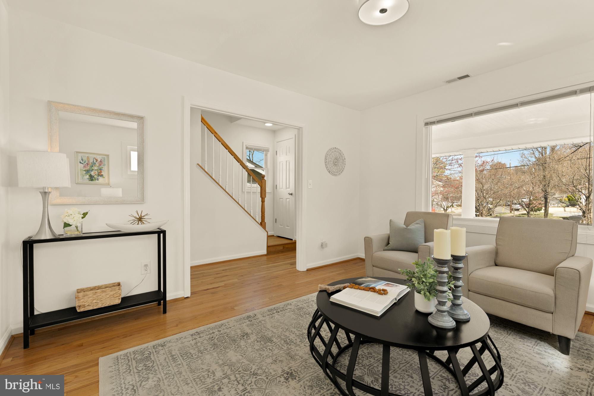 2425 Perry Street Northeast Washington, DC 20018 - Photo 5 of 43 a living room with furniture and a fireplace