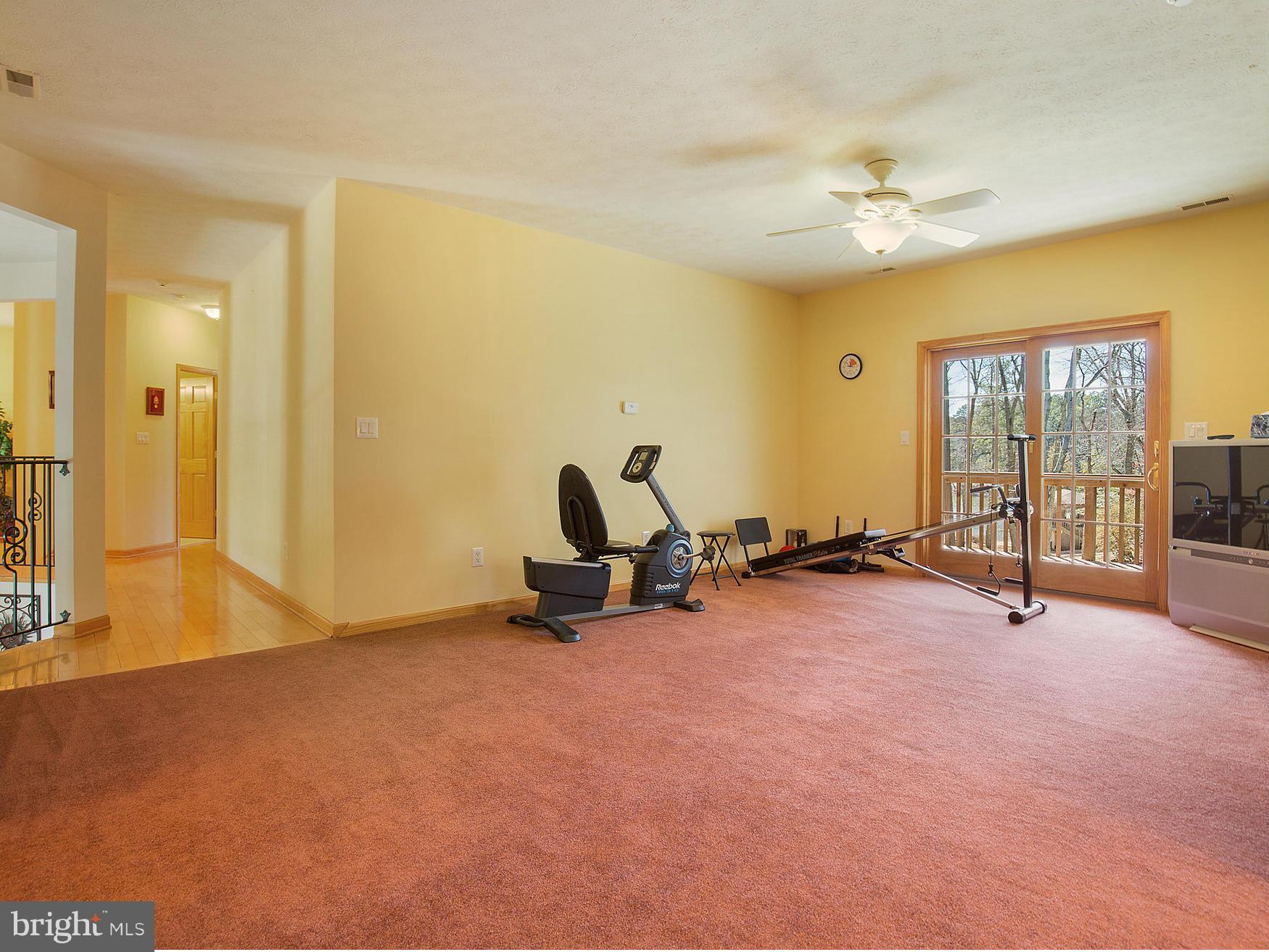 48510 Whitaker Road St. Inigoes, MD 20684 - Photo 20 of 30 a view of a room with gym equipment