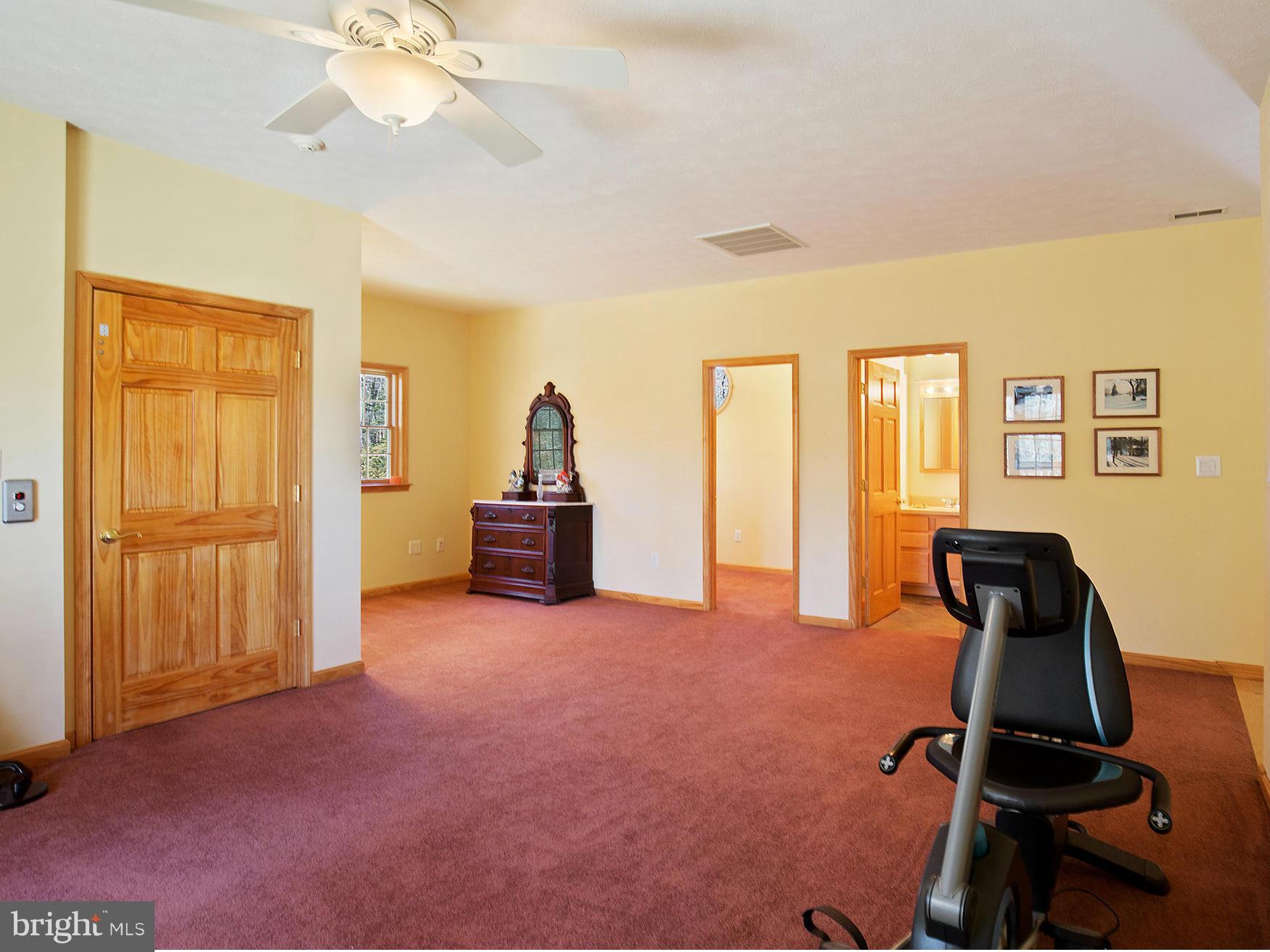 48510 Whitaker Road St. Inigoes, MD 20684 - Photo 21 of 30 a view of a room with gym equipment
