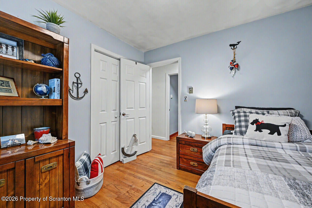 121 T Rt 351 Moscow, PA 18444 - Photo 57 of 79 a bedroom with bed and a book shelf