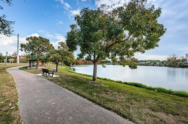 a house view with a lake view