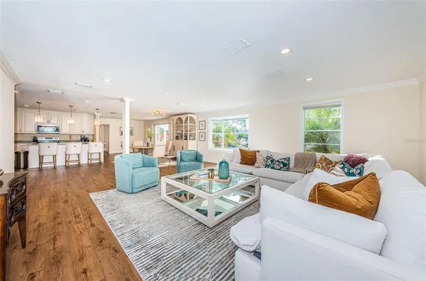 a living room with furniture and a table