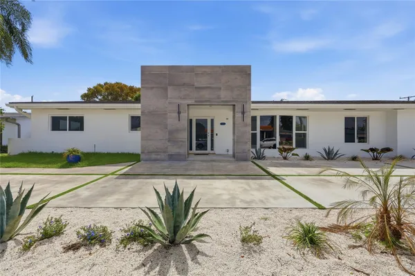 a view of a house with a patio