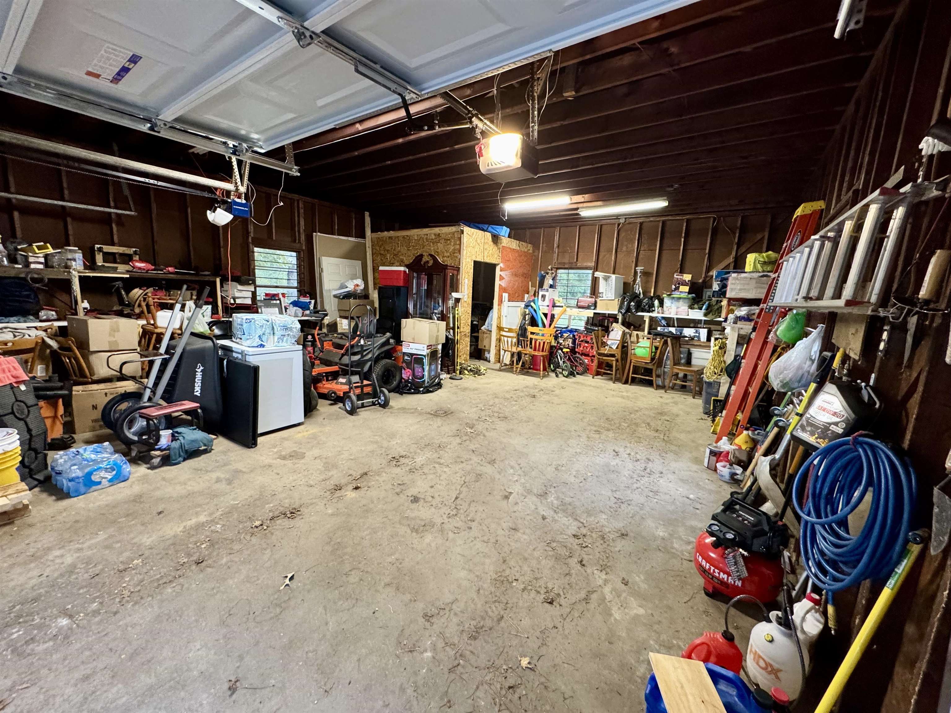 7692 Currie Road Millington, TN 38053 - Photo 11 of 13 a view of a storage room with a lot of stuff