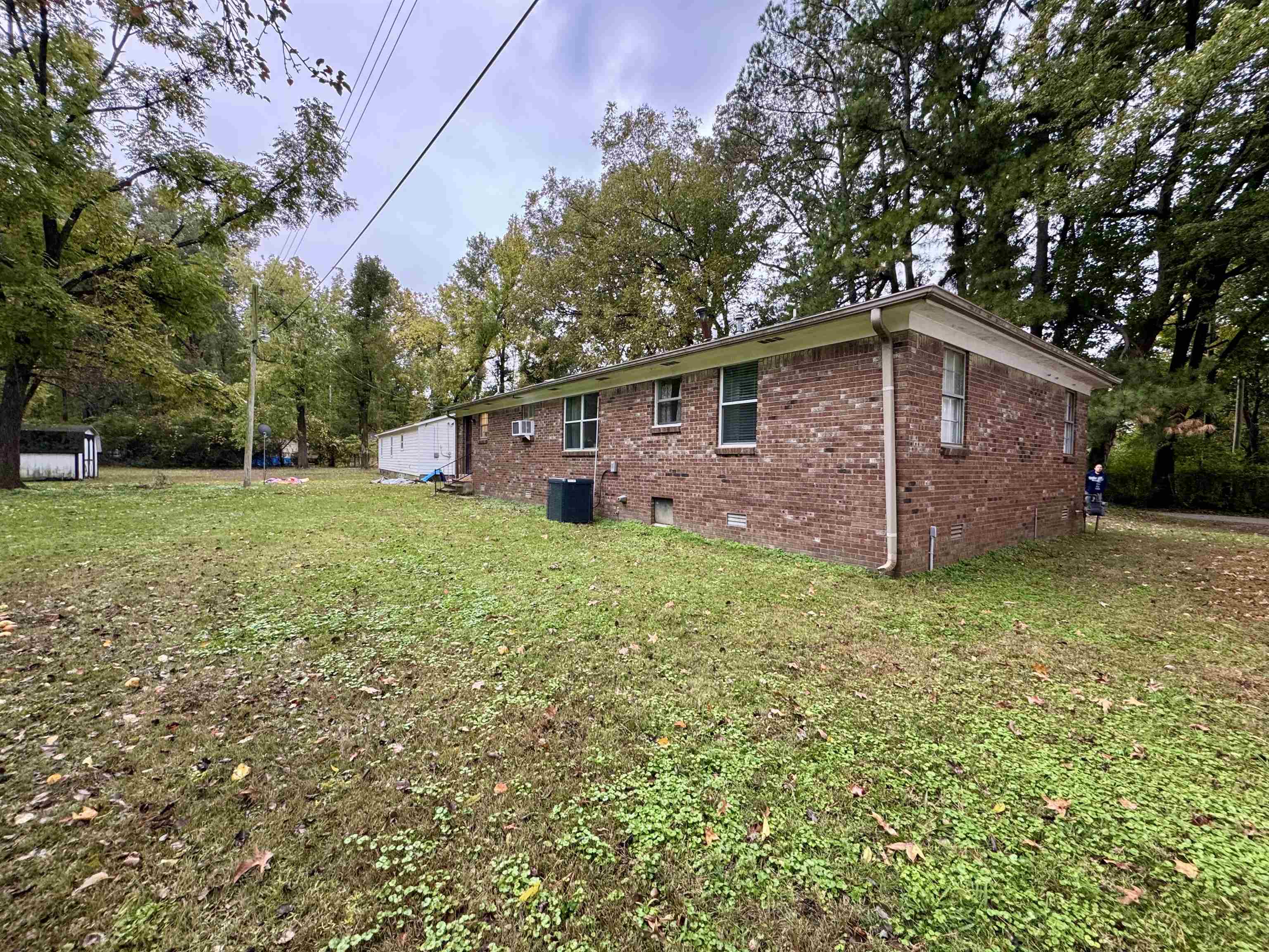7692 Currie Road Millington, TN 38053 - Photo 12 of 13 a front view of a house with a garden