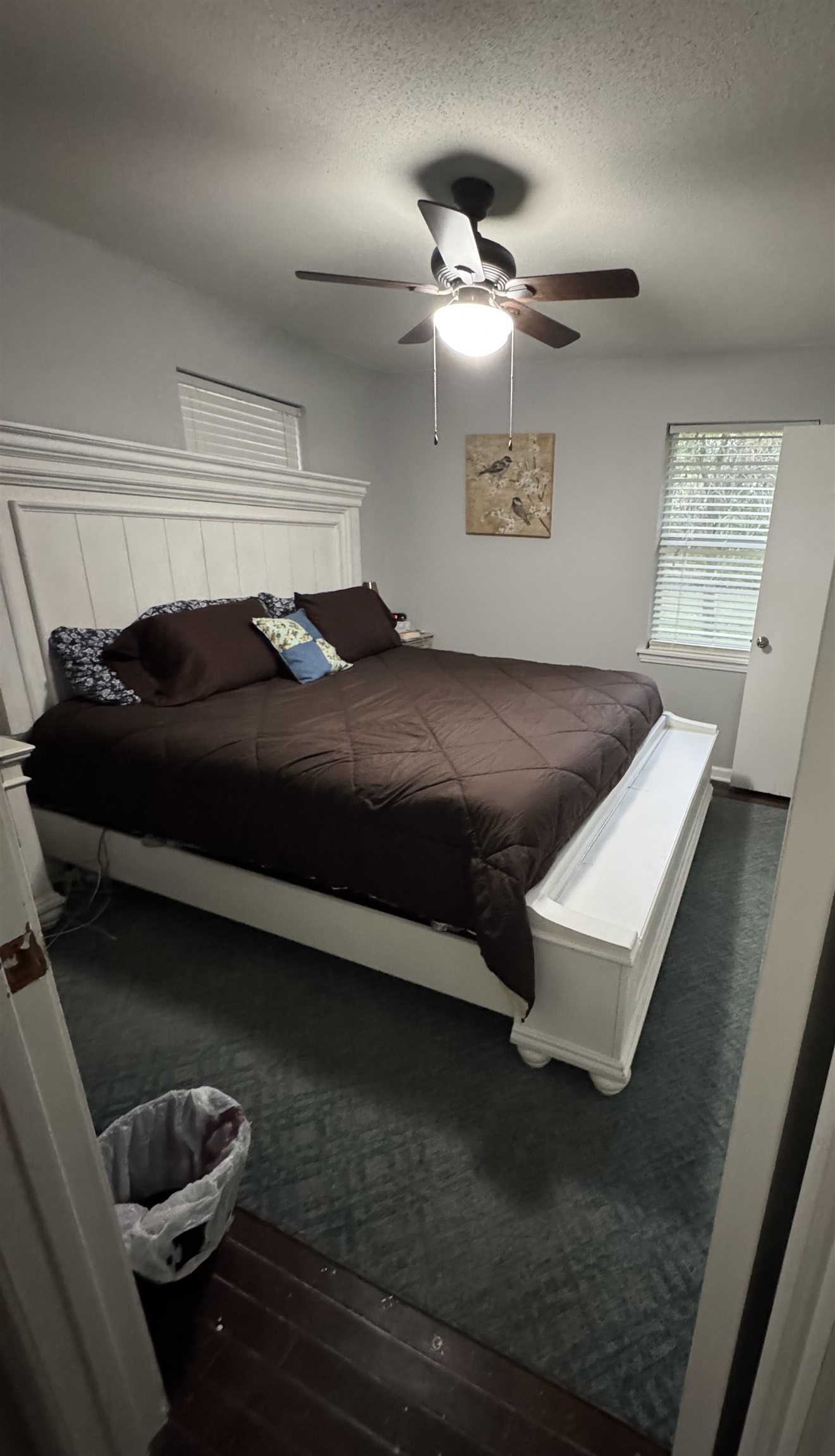 7692 Currie Road Millington, TN 38053 - Photo 6 of 13 a bedroom with a bed and a lamp on dresser