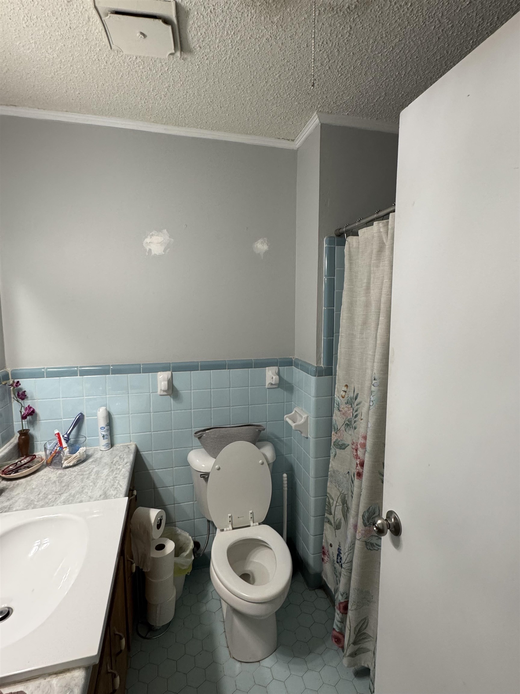 7692 Currie Road Millington, TN 38053 - Photo 7 of 13 a white toilet sitting next to a bathroom sink