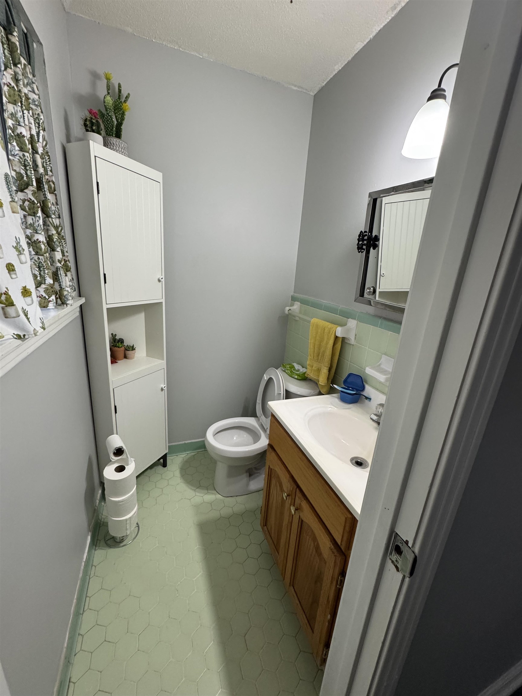 7692 Currie Road Millington, TN 38053 - Photo 9 of 13 a bathroom with a toilet and a sink