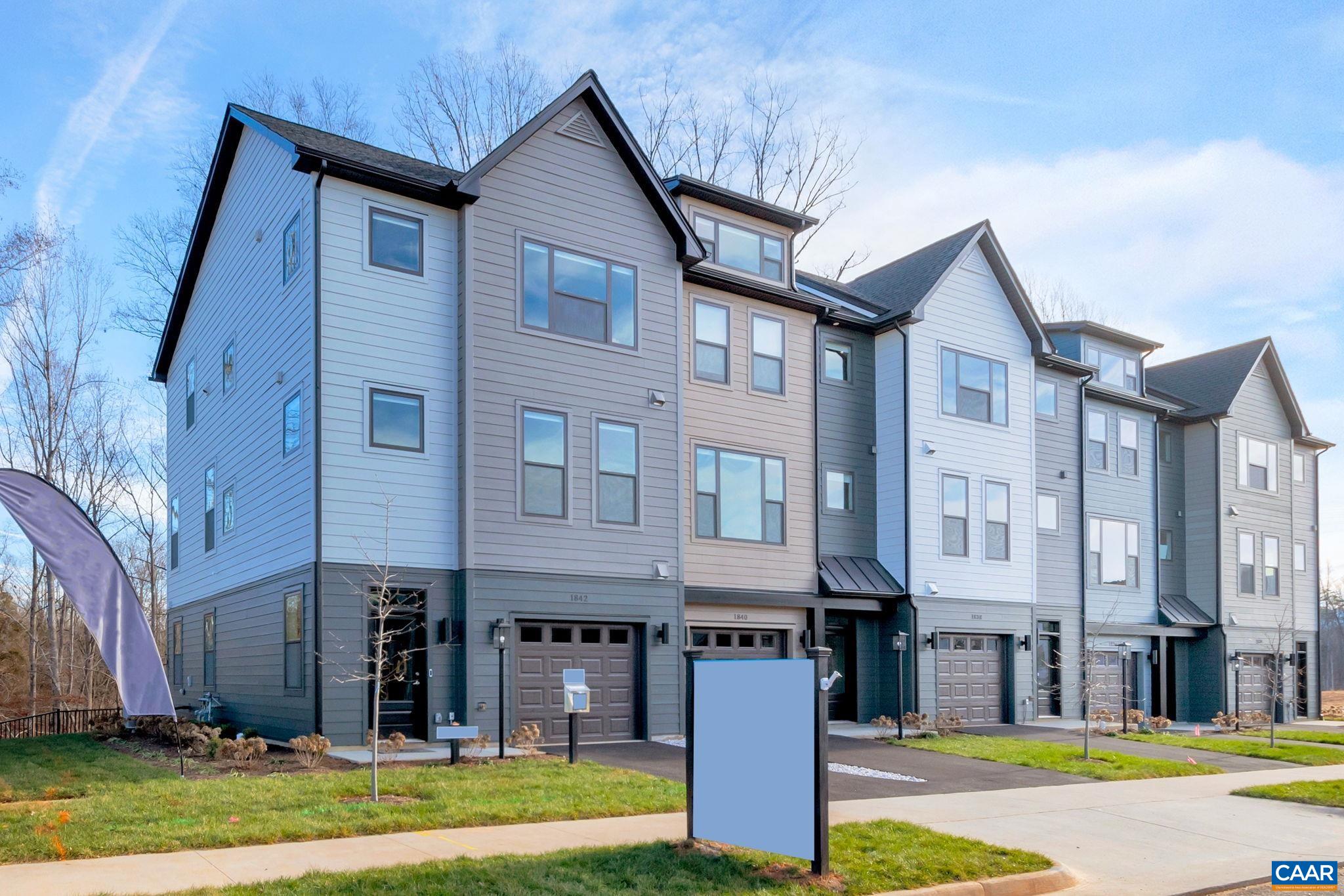 1842 Fowler Street Charlottesville, VA 22901 - Photo 2 of 44 a front view of a residential apartment building with a yard