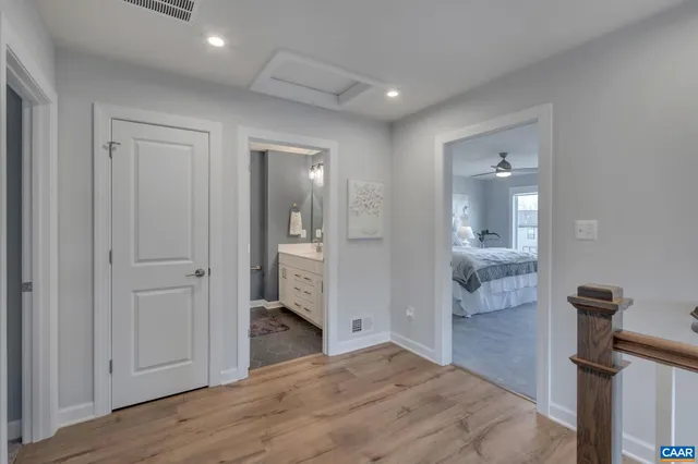 a view of a bathroom from the hallway