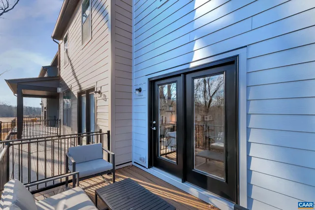 a view of a chairs on the deck