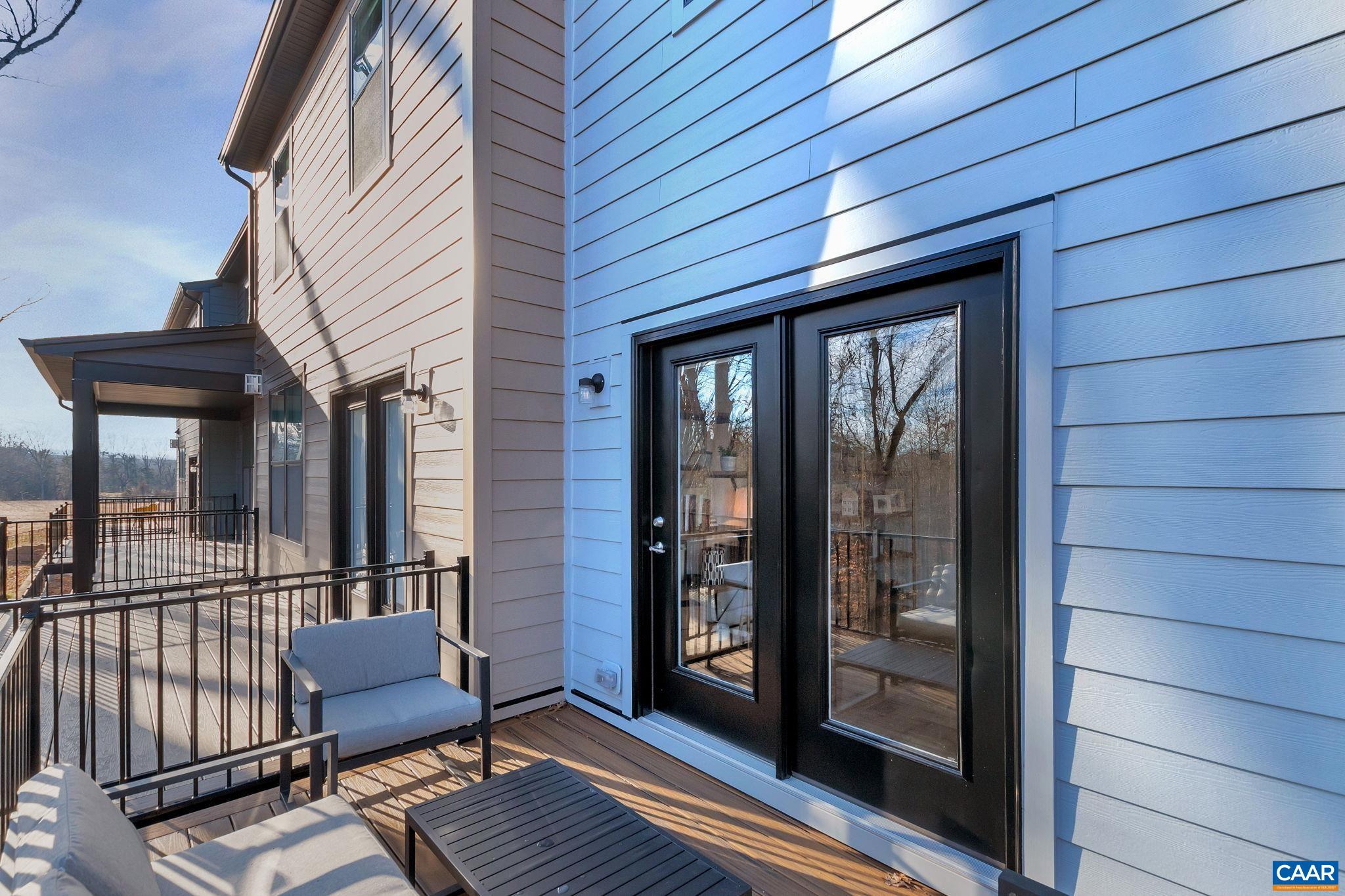 1842 Fowler Street Charlottesville, VA 22901 - Photo 30 of 44 a view of a chairs on the deck