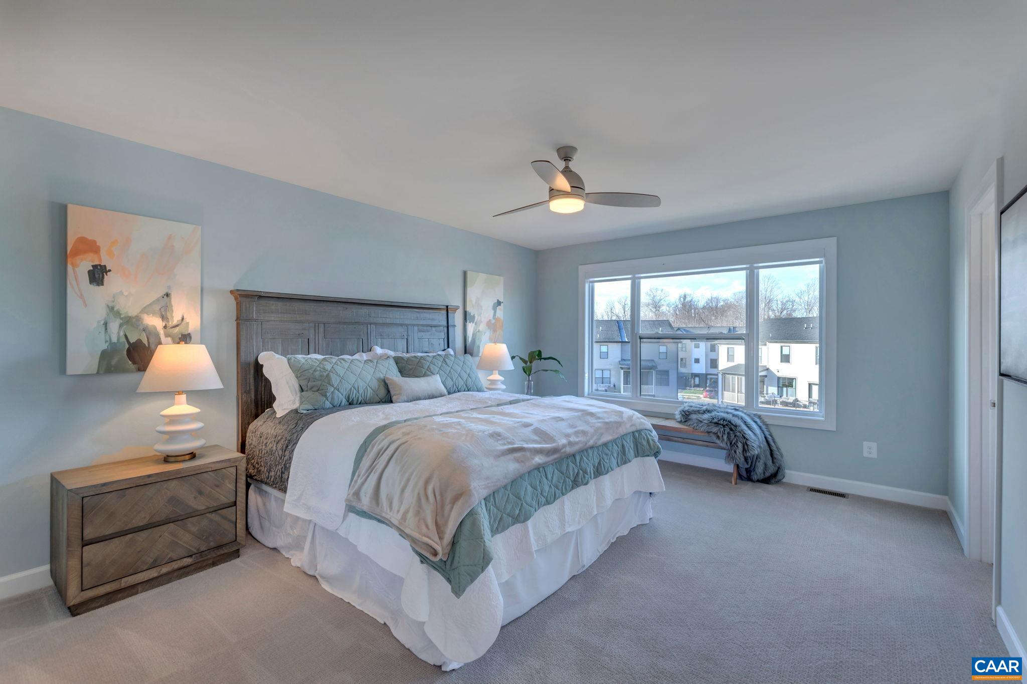 1842 Fowler Street Charlottesville, VA 22901 - Photo 31 of 44 a bed room with a bed and a window